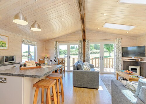 Luxurious lodge with stunning countryside views.
