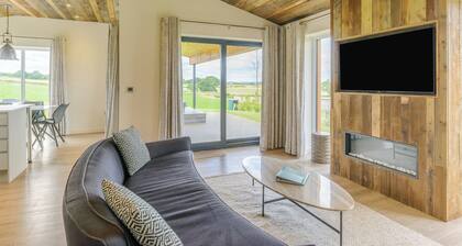 New in 2022. Luxurious and contemporary lodge with stunning countryside views.