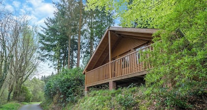 Timber lodge set by the lake with one double and one twin.