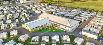 Modern and contemporary 12ft-wide caravan with one double and one twin.