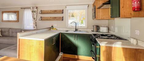 Refrigerador, horno, parrilla de estufa y tostadora