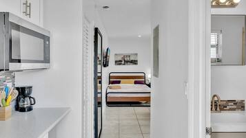 Iron/ironing board, travel crib, free WiFi, bed sheets