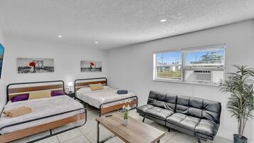 Iron/ironing board, travel crib, free WiFi, bed sheets