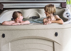 A hot tub with two people.