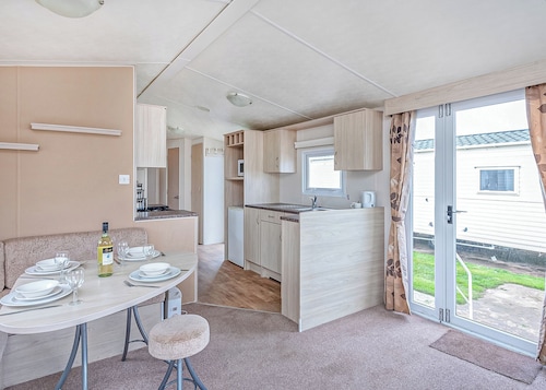 Caravan with one double and two twin.