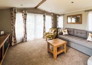 Living area - Quality 12ft-wide caravan with one double and one twin. (Chester)