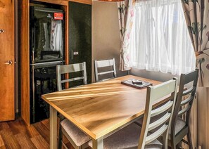 Dining - Quality 12ft-wide caravan with one double and one twin. (Chester)