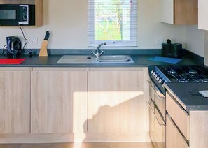 Fridge, oven, stovetop, toaster - New for 2019. Contemporary caravan with one double and two twin. (Cargill)