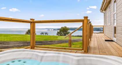 Stunning lodge with one double with en suite walk in shower and one twin.