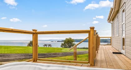 Stunning lodge with one double with en suite walk in shower and one twin.