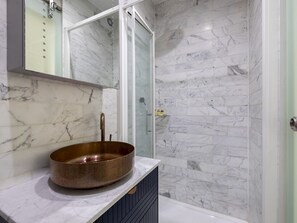 Shower, hair dryer, towels, soap