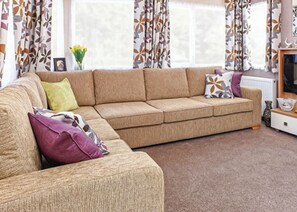 Living area - 12ft-wide caravan with one double and two twin. (Silloth)