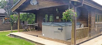 Spacious timber lodge with one double and one single in one room.