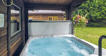 Spacious timber lodge with one double and one single in one room.