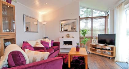 Lodge with one king-size double with TV.
