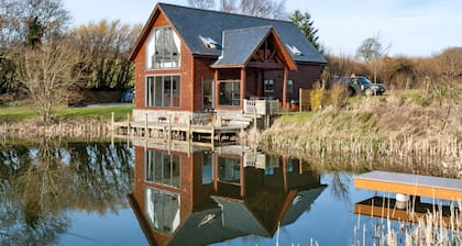 Stunning lodge built on the edge of the lake.