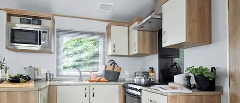 Refrigerador, horno, parrilla de estufa y tostadora