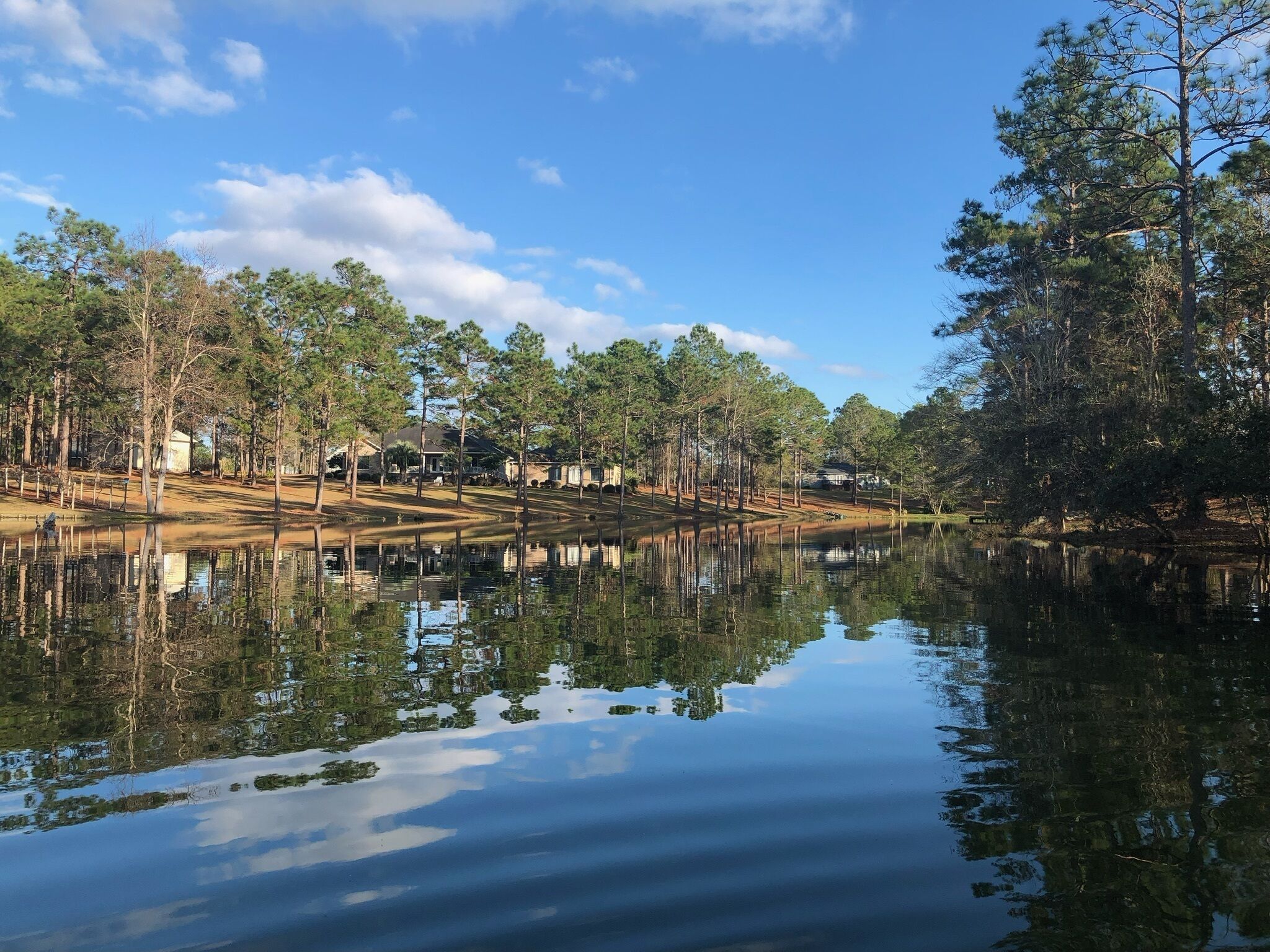 Quiet lake front property in peaceful neighborhood setting.