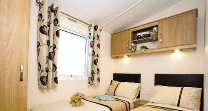 Top of the range 12ft-wide caravan with one double and one twin.