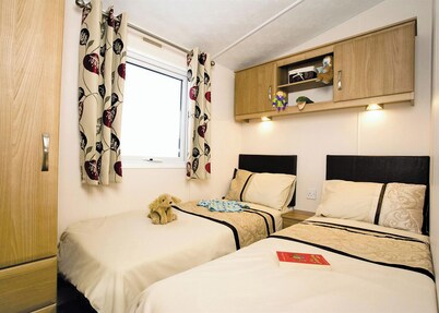 Top of the range 12ft-wide caravan with one double and one twin.