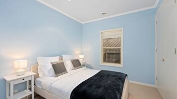 4 bedrooms, desk, iron/ironing board, travel cot