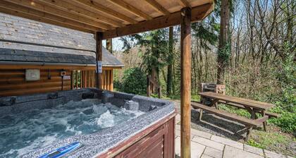 Timber lodge set in an elevated position with views of the lakes.