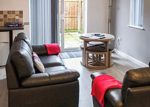 Comfortable modern cottage with one double and one with adult size bunks.