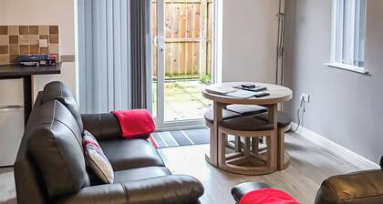 Comfortable modern cottage with one double and one with adult size bunks.