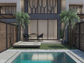 A modern outdoor pool area with a seating arrangement, two potted plants, and a decorative wall. - JnV Luxury Villas (Chania)