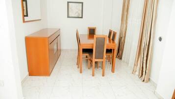 Superior Apartment | Living area | 32-inch flat-screen TV with cable channels, TV, offices