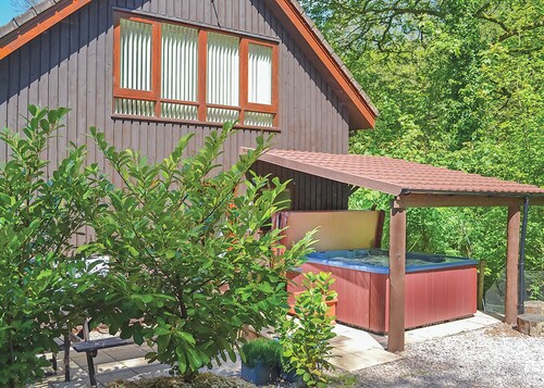 Luxury lodge residing at the top of the wooded valley.