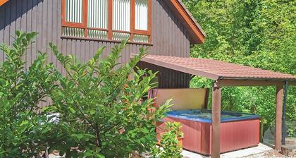 Luxury lodge residing at the top of the wooded valley.