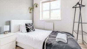 4 bedrooms, iron/ironing board, WiFi (free), bed sheets