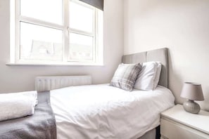 4 dormitorios, tabla de planchar con plancha, wifi gratis y ropa de cama