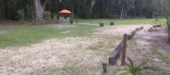 Full hook up RV Trailer site on private 1 acre Conveniently located