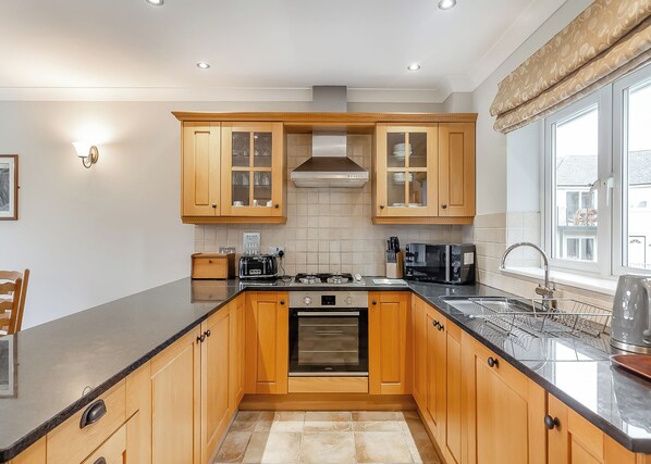 Fridge, oven, stovetop, dishwasher - 2 bedroom accommodation in Porth, Nr Newquay (Porth, Nr Newquay)