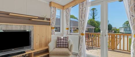 Flat-screen TV, video game console