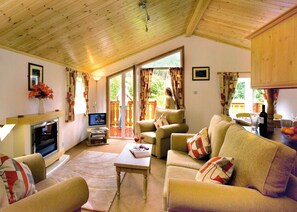 Living area - Log cabin with one double with en suite shower and two twin. (Ettrick Valley, Nr Hawick)