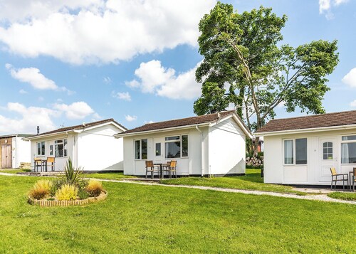 Contemporary cottage with one double and one with bunks.