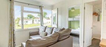 Contemporary cottage with one double and one with bunks.