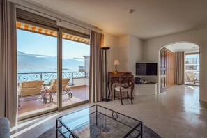 Suite | Ropa de cama hipoalergénica y minibar con artículos gratuitos
