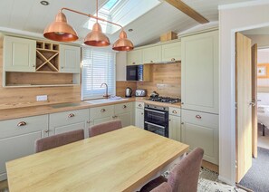 Fridge, oven, stovetop, dishwasher - Modern, contemporary holiday home facing the sea. (Lendalfoot)