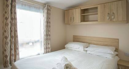Very comfortable, modern and contemporary caravan with one double and two twin.