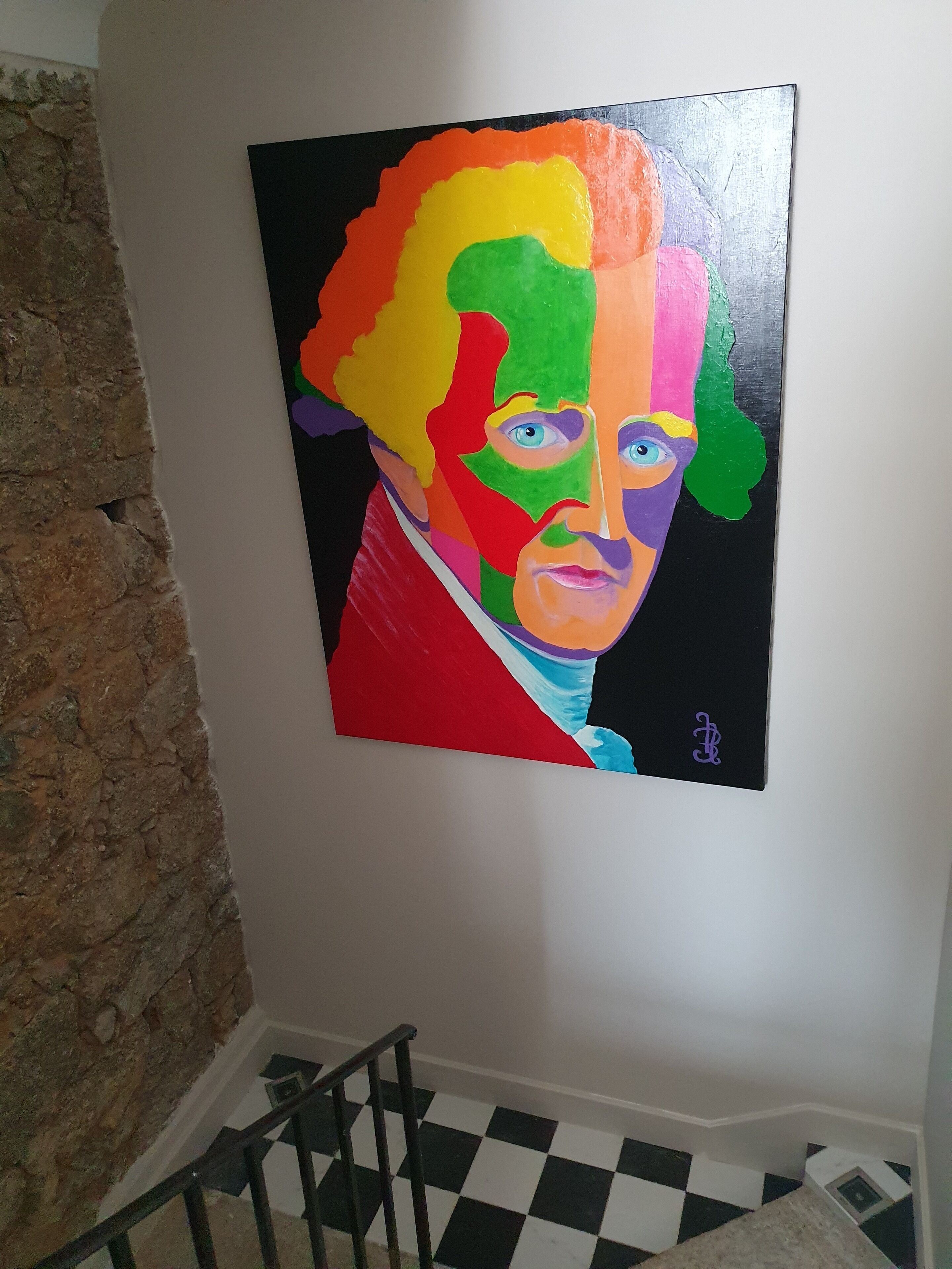 Un cuadro de colores en una pared.