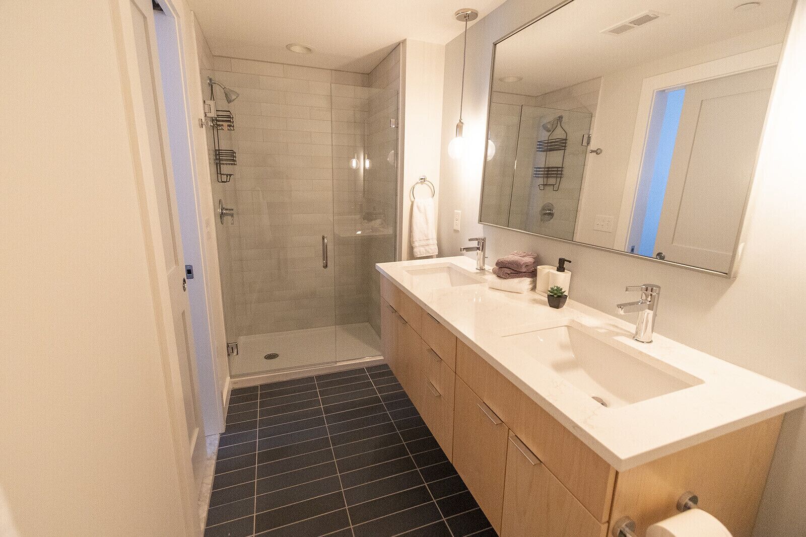 Shower, hair dryer, towels, toilet paper
