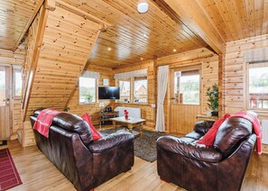 Living area - Set in a peaceful location and perched over the lake. (Anglesey)