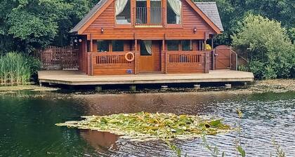 Set in a peaceful location and perched over the lake.