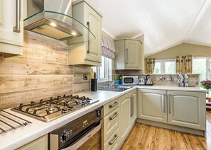 Fridge, oven, stovetop, toaster - Modern and contemporary 14ft-wide lodge style holiday home. (Water Yeat, Nr Coniston)