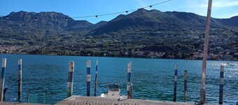 Open space lakefront apartment with pool in Monte Isola