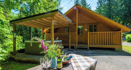 Timber lodge set in an elevated woodland position with one double and one twin.